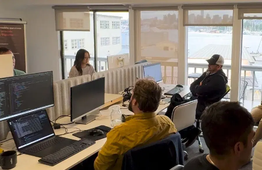 Employees working on a office setup.